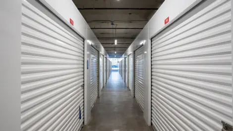 Clean, hallway of storage units in Springfield, MA at Devon Self Storage Springfield MA