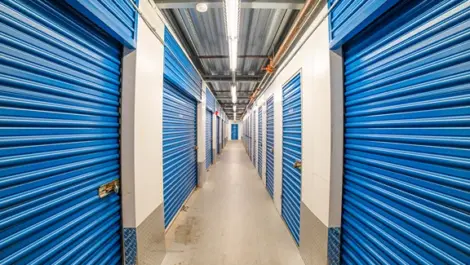 blue doors to Devon Self Storage - Pennsauken, hallway of storage units