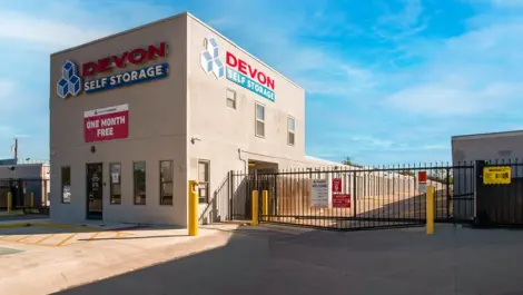 Gated view and front entrance to Devon Self Storage - Perrin in San Antonio, TX