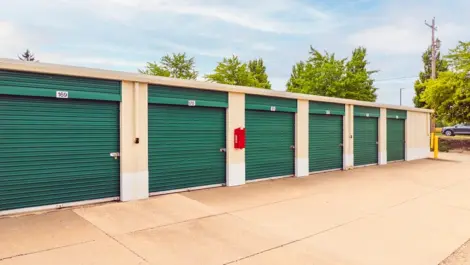 Green doors of outdoor storage units