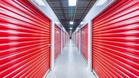 Indoor Storage Units in Grand Rapids, MI. Clean with red doors. Devon Self Storage- Ball Ave.