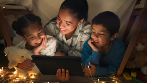 Mom and children watching ipad