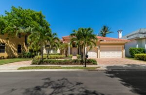 House with palm trees.